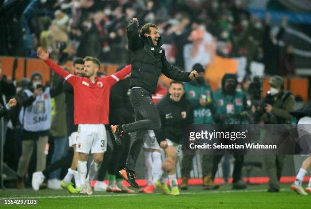 Markus Weinzierl, Head Coach of FC Augsburg celebrates after the Bundesliga match between FC Augsburg and FC Bayern München at WWK-Arena on November...