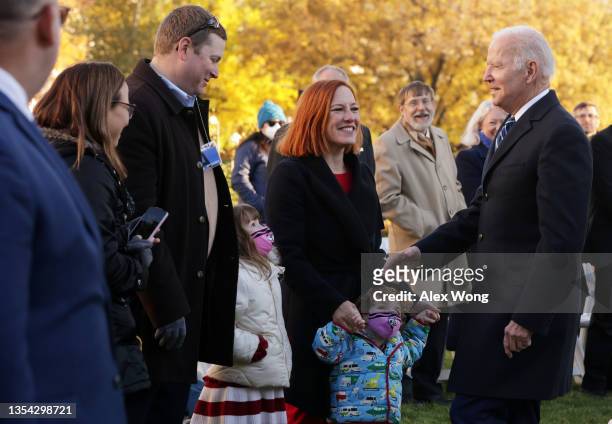 President Joe Biden greets White House Press Secretary Jen Psaki and her family during the 74th annual Thanksgiving turkey pardon of Peanut Butter...