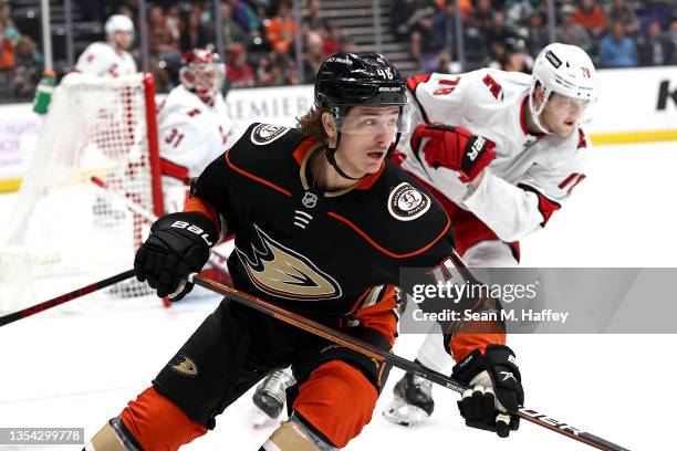 Trevor Zegras of the Anaheim Ducks skates to a loose puck during the first period of a game against the Carolina Hurricanes at Honda Center on...