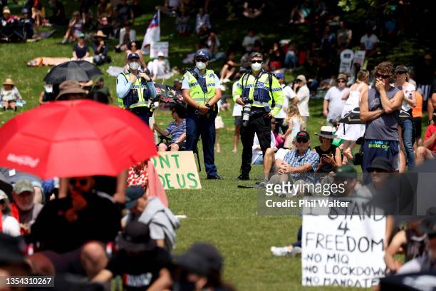 Police look on as freedom and rights, along with anti-vaccination activists gather in the Auckland Domain on November 20, 2021 in Auckland, New...