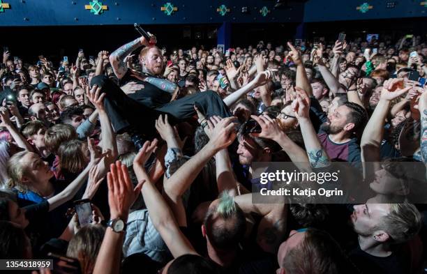 Frank Carter of Frank Carter & The Rattlesnakes crowd surfs during a performance at O2 Academy Birmingham on November 19, 2021 in Birmingham, England.