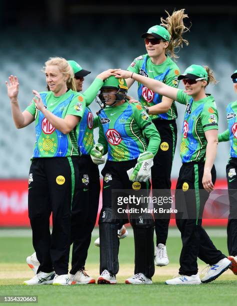Kim Garth of the Melbourne Stars celebrates the wicket of Beth Mooney of the Perth Scorchers during the Women's Big Bash League match between the...
