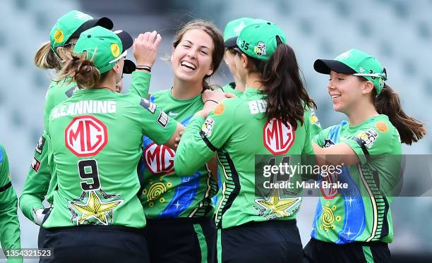 Tess Flintoff of the Melbourne Stars celebrates after taking the wicket of Sophie Devine of the Perth Scorchers during the Women's Big Bash League...