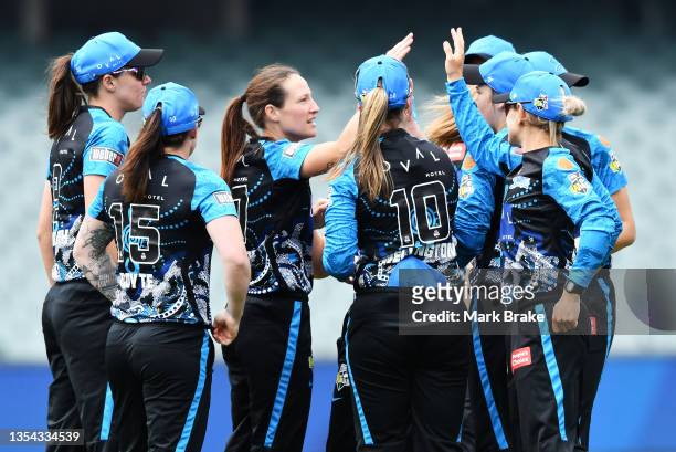 Megan Schutt of the Adelaide Strikers celebrates after taking the wicket of Alyssa Healy of the Sydney Sixers during the Women's Big Bash League...