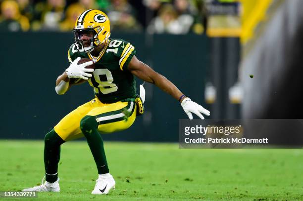 Randall Cobb of the Green Bay Packers runs with the ball against the Seattle Seahawks in the second half at Lambeau Field on November 14, 2021 in...