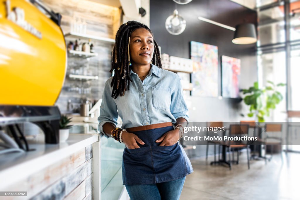 Portrait of female coffeeshop owner in coffeeshop