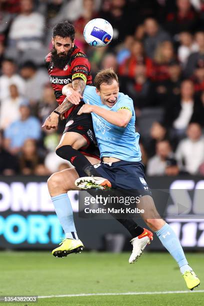 Rhys Williams of the Wanderers and Alex Wilkinson of Sydney FC compete for the ball during the A-League match between Western Sydney Wanderers and...
