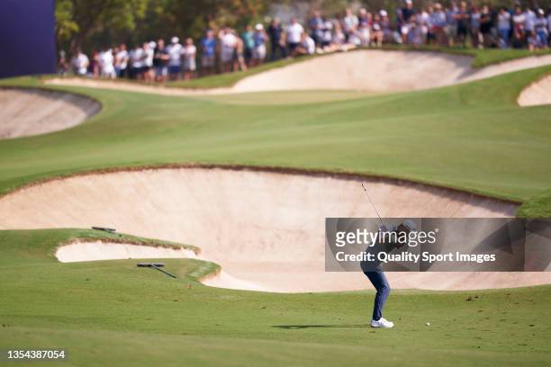 Collin Morikawa of United States plays a shot during Day Three of The DP World Tour Championship at Jumeirah Golf Estates on November 20, 2021 in...
