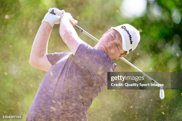 Robert Macintyre of Scotland plays a shoot during Day Three of The DP World Tour Championship at Jumeirah Golf Estates on November 20, 2021 in Dubai,...