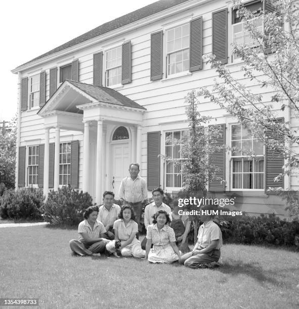 Mountain View, Caifornia. The Shibuya family on the lawn in front of their beautiful home before evacuation to War Relocation Authority centers where...