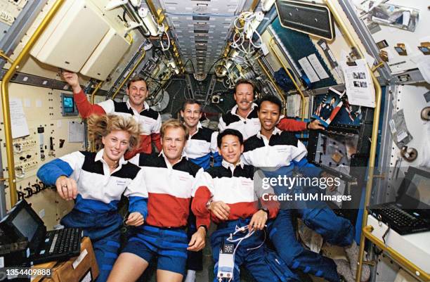 --- The crew members assemble for their traditional in-flight portrait in this 35mm frame photographed in the Science Module aboard the...