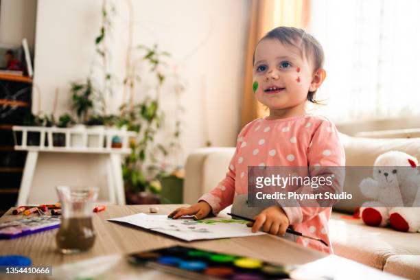 happy small girl portrait - happy toddler stockfoto's en -beelden