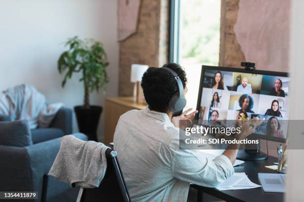 businessman gestures during video conference - virtual presentation stock pictures, royalty-free photos & images