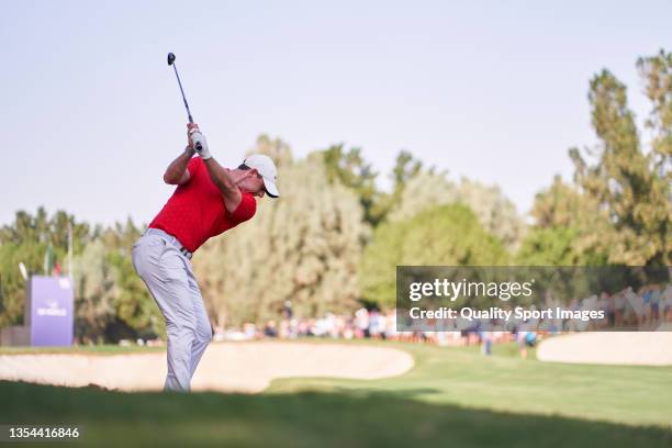 Rory McIlroy of Northern Ireland plays a shot during Day Three of The DP World Tour Championship at Jumeirah Golf Estates on November 20, 2021 in...