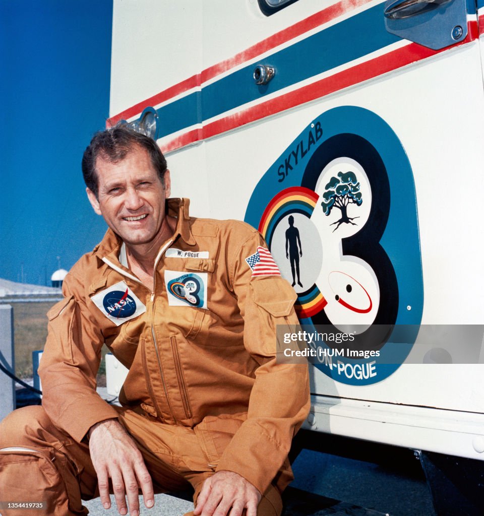 (8 Nov. 1973) --- Astronaut William R. Pogue, pilot of the Skylab 4 mission, relaxes on the running board of the transfer van during a visit to the Skylab 4/Saturn 1B space vehicle at Pad B, Launch Complex 39, Kennedy Space Center, Florida.