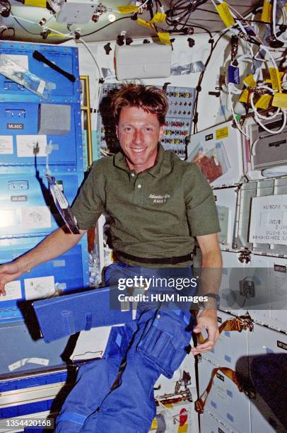--- Prior to the Space Shuttle Atlantis' docking with Russia's Mir Space Station, astronaut C. Michael Foale was photographed on the middeck going...