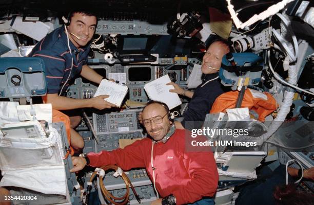 --- The 'blue-shift' crew members pose on the flight deck of the Earth-orbiting Space Shuttle Atlantis. Left to right are Andrew M. Allen, pilot;...