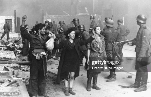 Warsaw Uprising, Jewish poles under arrest by Nazi soldiers in Warsaw ghetto ca. 1940s.