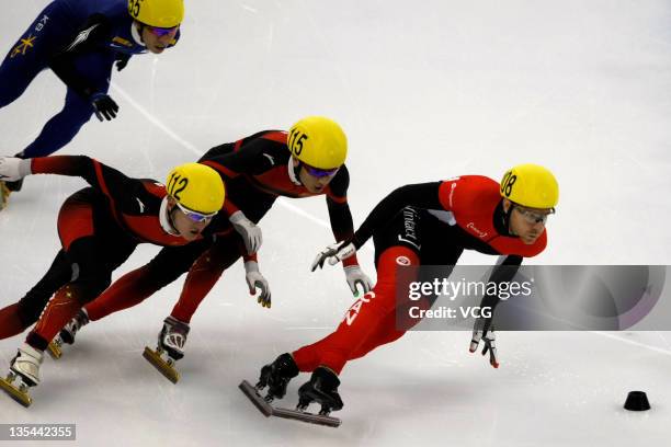 Olivier Jean of Canada leads Gong Qiuwen and Liang Wenhao of China in the men's 500m final during day two of 2011 ISU World Cup Short Track at...