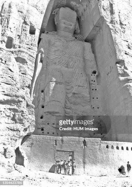 View of the taller Bamiyan Buddha statue, known as Salsal, standing in his giant niche ca. 1928.