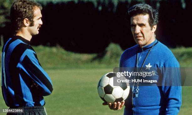 Italian footballer Alessandro 'Sandro' Mazzola and French-Argentine football manager Helenio Herrera in training with Inter Milan in the 1973–74...