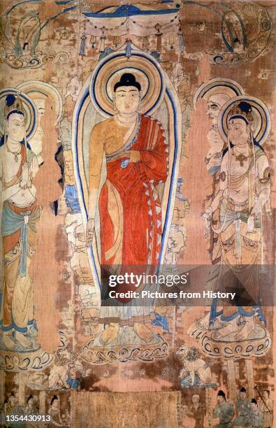 The Sakyamuni Buddha is shown flanked by two disciples teaching the Lotus Sutra on 'Vulture Peak'. Siddartha Gautama, also known as __kyamuni , is...