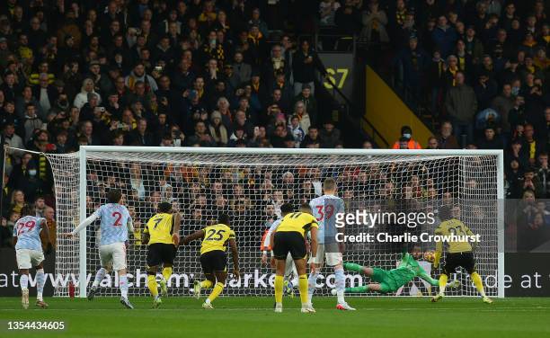 Ismaila Sarr of Watford FC has a penalty saved by David De Gea of Manchester United during the Premier League match between Watford and Manchester...