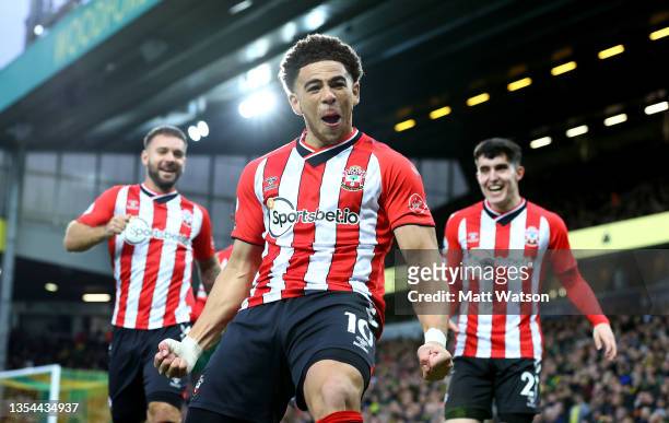 Che Adams of Southampton celebrates after opening the scoring during the Premier League match between Norwich City and Southampton at Carrow Road on...