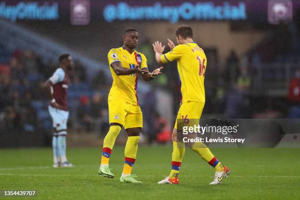 Marc Guehi of Crystal Palace celebrates with teammate Joachim Andersen after scoring their team's third goal during the Premier League match between...