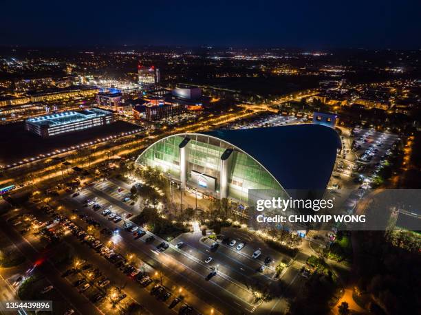 drone view of milton keynes central at night - milton keynes stock pictures, royalty-free photos & images