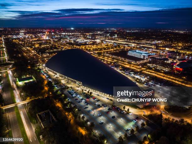 drone view of milton keynes central at night - milton keynes stock pictures, royalty-free photos & images