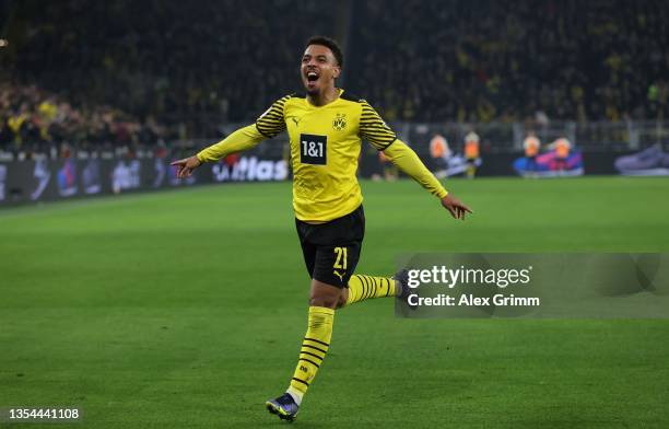Donyell Malen of Borussia Dortmund celebrates after scoring the first goal during the Bundesliga match between Borussia Dortmund and VfB Stuttgart at...