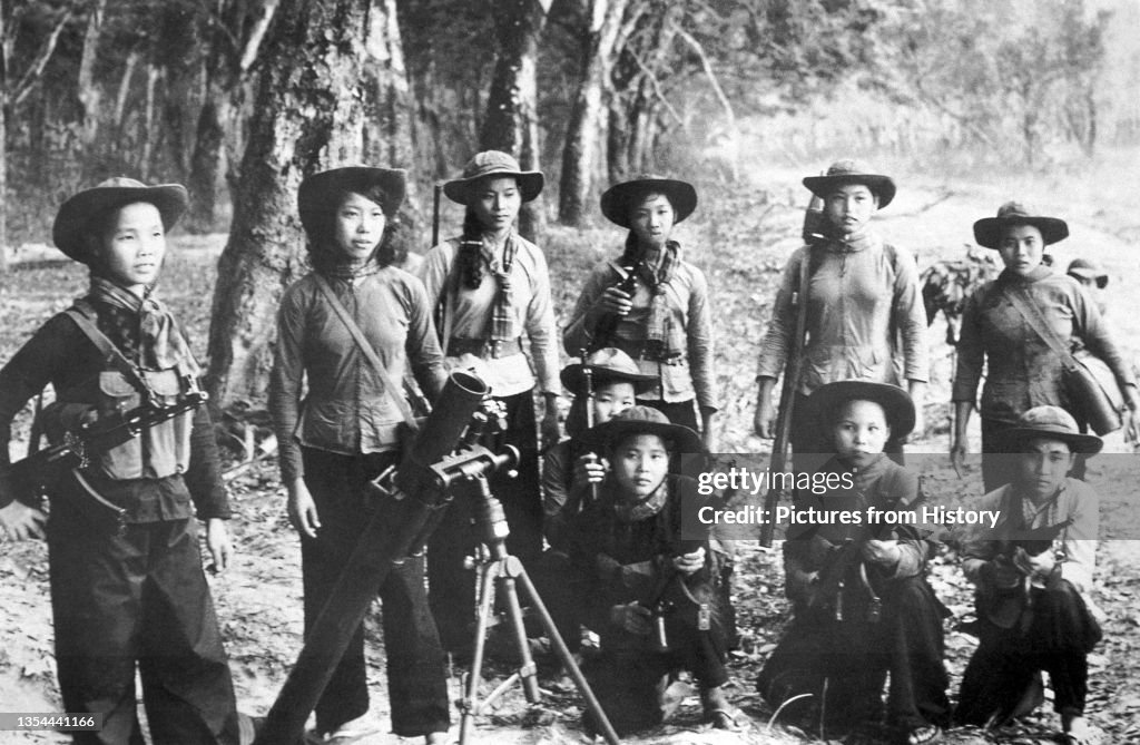 Vietnam: NLF (Viet Cong) female artillery squad, near Cu Chi, 1968