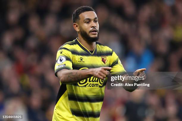 Joshua King of Watford FC celebrates after scoring their team's first goal during the Premier League match between Watford and Manchester United at...