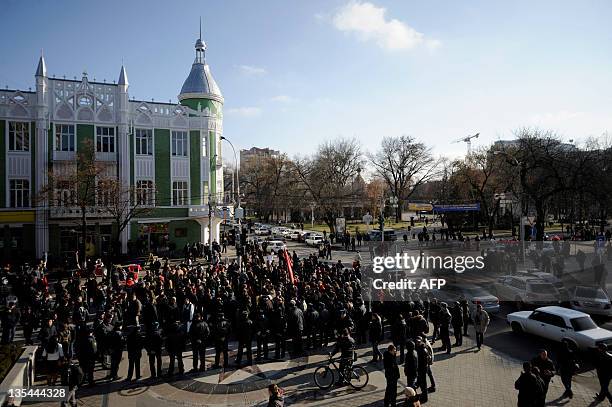 Opposition activists protest against the alleging mass fraud in the December 4 parliamentary polls in the southern Russian city of Krasnodar, on...