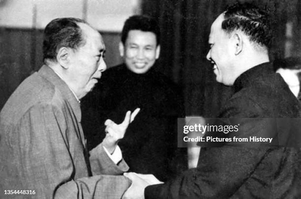 Khmer Rouge leaders Pol Pot and Ieng Sary meet Chairman Mao Zedong, Beijing, 1976. Mao, who looks somewhat senile but enthusiastically supported the...