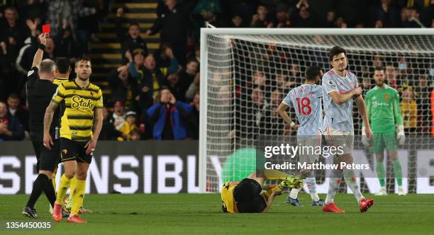 Harry Maguire of Manchester United is sent off by Referee Jon Moss during the Premier League match between Watford and Manchester United at Vicarage...