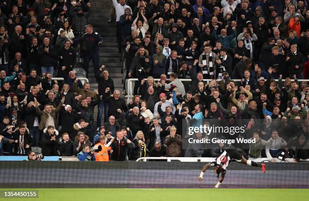 Allan Saint-Maximin of Newcastle United celebrates after scoring their team's third goal during the Premier League match between Newcastle United and...