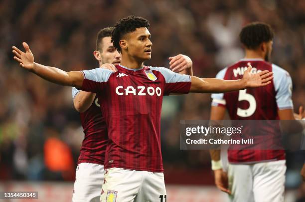 Ollie Watkins of Aston Villa celebrates after scoring their team's first goal during the Premier League match between Aston Villa and Brighton & Hove...