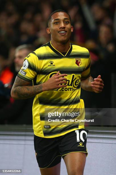 Joao Pedro of Watford FC celebrates after scoring their team's third goal during the Premier League match between Watford and Manchester United at...