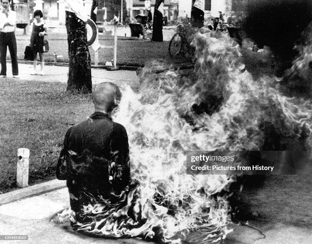 A Buddhist monk burns himself to death, Saigon.