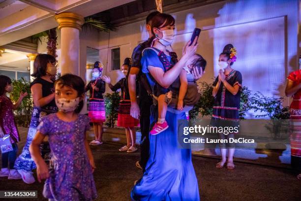 Families enter the Yee Peng festival on November 20, 2021 inLamphun, Thailand. The Gassan Panorama Golf Course in northern Thailand hosts its annual...