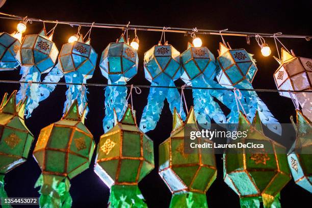 Paper lanterns decorate the walls of the Yee Peng festival on November 20, 2021 inLamphun, Thailand. The Gassan Panorama Golf Course in northern...