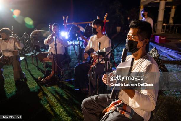 Musicians play traditional Thai music at the Yee Peng Festival on November 20, 2021 inLamphun, Thailand. The Gassan Panorama Golf Course in northern...