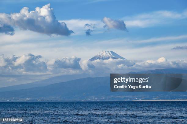 mt. fuji over a sea - suruga bay stock pictures, royalty-free photos & images