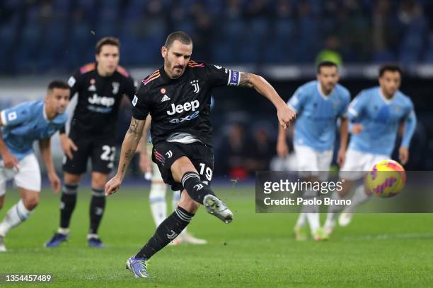 Leonardo Bonucci of Juventus scores their team's first goal during the Serie A match between SS Lazio and Juventus at Stadio Olimpico on November 20,...
