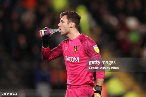 Nathan Baxter of Hull City drinks from a bottle thrown onto the pitch during the Sky Bet Championship match between Hull City and Birmingham City at...