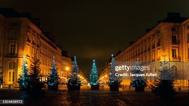 christmas trees and lights on square - street party stock photos et images de collection