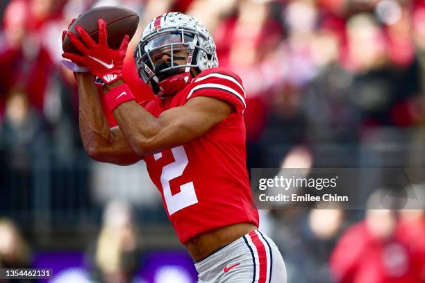 Chris Olave of the Ohio State Buckeyes catches a pass for a touchdown during the first half of a game against the Michigan State Spartans at Ohio...