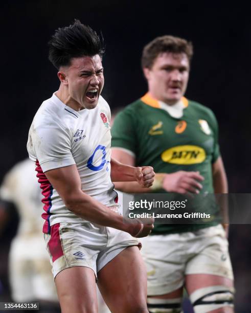 Marcus Smith of England celebrates after being awarded a penalty on the last play during the Autumn Nations Series match between England and South...